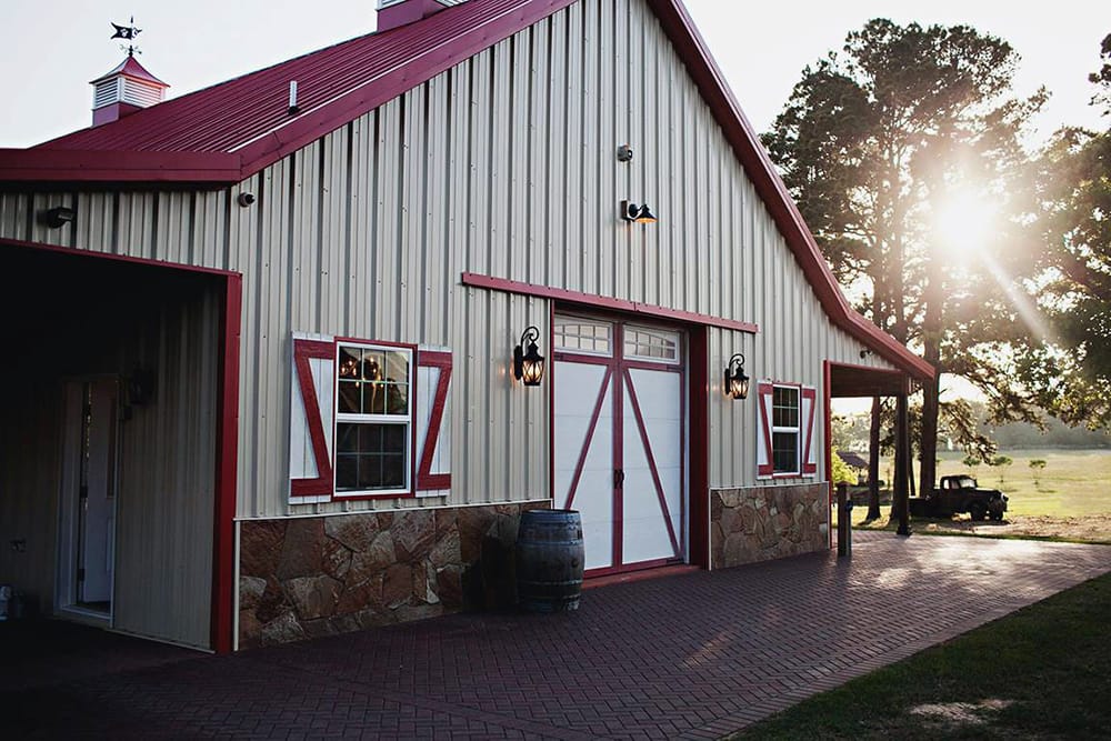 Sun setting behind the trees at The Barn at Cypress Ridge