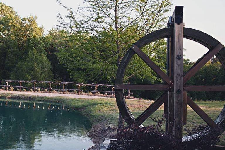 Water Wheel on the pond at The Barn at Cypress Ridge